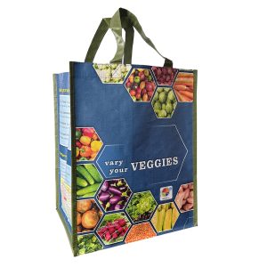 Reusable bag with blue background with fruits and veggies on it. Also includes the words "Vary your Veggies" on it.