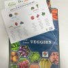 Reusable bag with blue background with fruits and veggies on it. Also includes the words "Vary your Veggies" on it. With the addition of posters that come with the bags